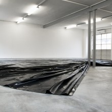 Kilian Rüthemann, Untitled (Black Cover), 2013. Installation View at Peep-Hole, Milan. Courtesy: RaebervonStenglin, Zürich.