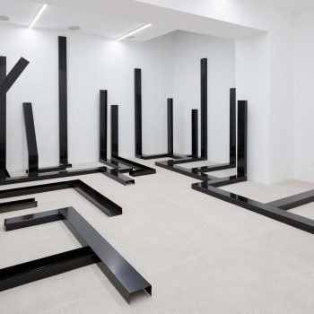 ESCAPE, site-specific sculptural and sound installation, bent and black lacquered aluminum sheet with stainless steel connections, dimensions variable, 2024, Galeria Fernando Santos.