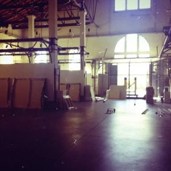 Setting up the exhibition "Nessun luogo è lontano" at the Ex-Slaughterhouse of Padua, 2014