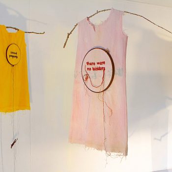 Elvira Clayton, Installation view of The Sale Of Loise, 2018, plant-dyed Osanburg, cotton, embroidery hoops, twigs, shells. Photo: Tonita Cervantes.