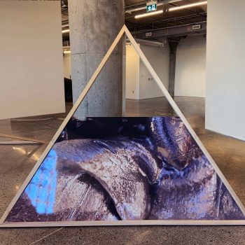 Kara Springer, "Do I have to build you a fucking pyramid?", Doublesided UV prints on dibond, poplar wood armature, 96 x 96 x 96 in., installation dimensions variable, courtesy of MOCA (Museum of Contemporary Art) Toronto.