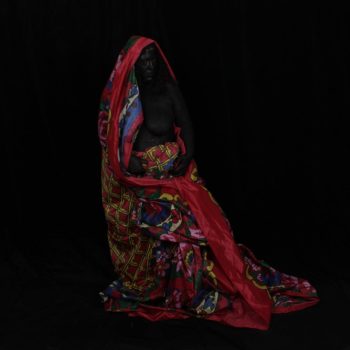 Self-Portrait. The impulse for this work is the author’s light skin-color which allows her to pass in the society as a non-Roma. The self-portrait is a declaratory act of making herself visible as a Roma and simultaneously self-stylization as a black Madonna, i.e. an iconic female figure with whom Roma could identify.